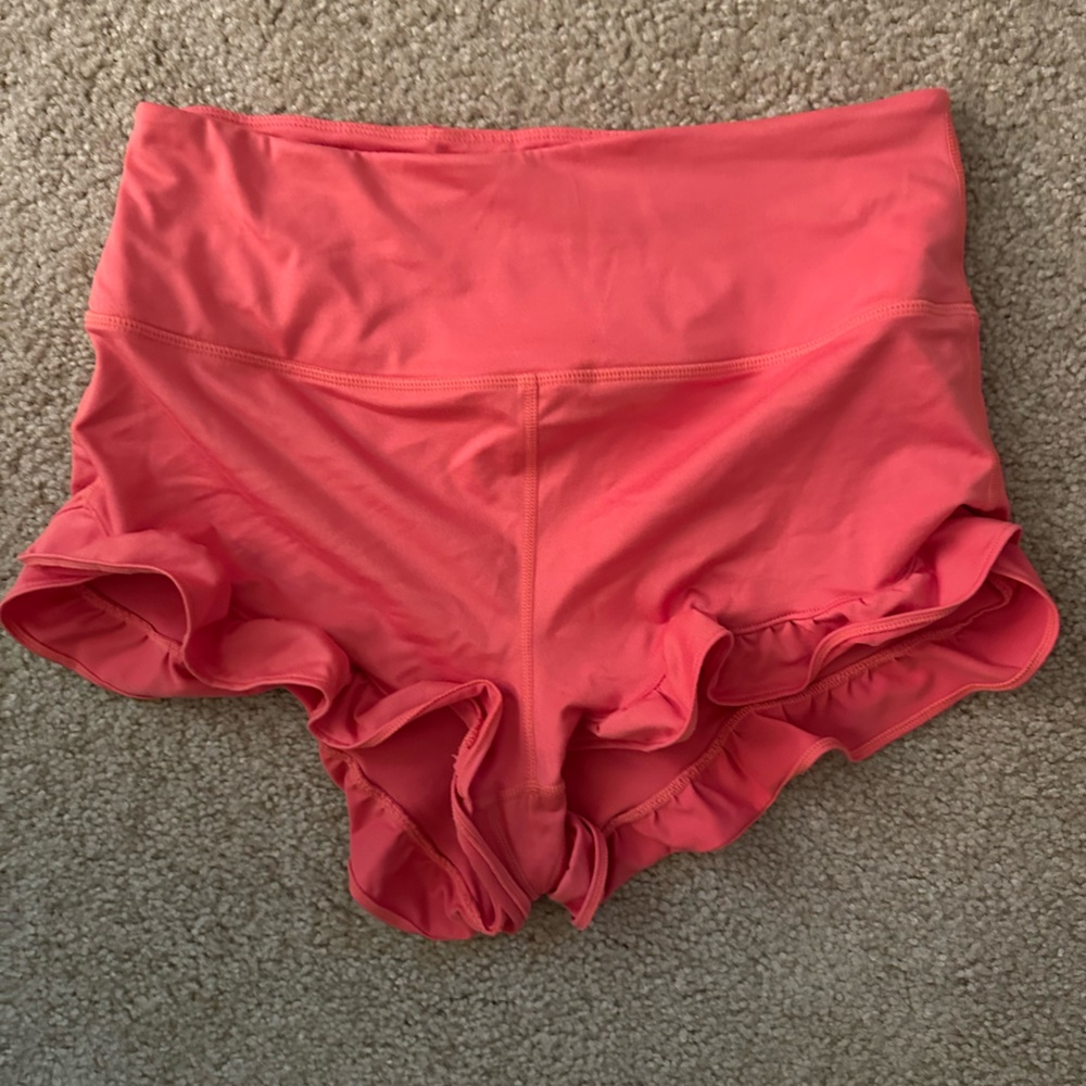 Free People Movement Ruffle edge spandex Shorts Coral.